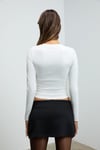 GRIGROS Kadın Esnek Kumaşlı Vücuda Oturan Slim Fit Uzun Kollu Beyaz T-Shirt