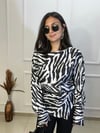 ŞAMDAN ASİNETTRİK KEMERLİ ZEBRA DESEN