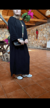 kolu detaylı sade siyah rahat kalıp elbise
