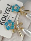 Kolyeli new32 küpe (14 ayar altın rengi)