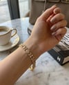 Toptan 316L Çelik Gold Markiz Yaprak Desenli ve Sıralı Taşlı Kadın Bileklik