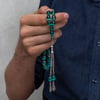Metal Püsküllü Arpa Kesim Sıkma Kehribar Tesbih
