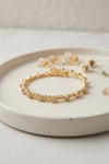 Gold Renk Dorika Model Sıralı Zirkon Taşlı Kadın Bileklik