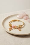 Pembe Uçan Model Charmlı Gold Renk Bileklik