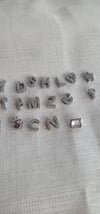 Zirkon taşlı çelik charm