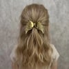 Işıltılı Glitter Tasarımlı Fiyonk Saç Tokası Gold
