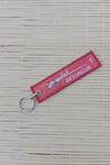Aksungur Remove Before Flight Yazili Kirmizi Beyaz Nakis İslemeli Bez Anahtarlik