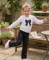 Kız Çocuk TakımKız Çocuk Taşlı Kot Pantolon ve Fiyonklu Sweatshirt İkili Takım Siyah