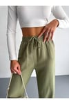 muslin-kumas-paca-puskul-detay-pantolo-fa0a9e.jpg