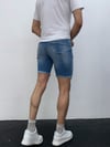 Açık Mavi Yıkamalı Paça Püskül Detay Slim Fit Jean Şort