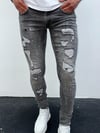 Erkek Gri Yıkamalı Yırtık Detay Slim Fit Likralı Skinny Jean Pantolon