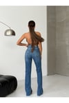 Kadın Yüksek Bel Çapraz Bel Detaylı Bol Paça Mavi Denim Jean Pantolon