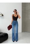 Yüksek Bel Açık Mavi Geniş Paça Manşet Detaylı Denim Kadın Pantolon