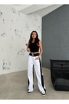 BEYAZ BAGGY PANTOLON YANLARI SİYAH DETAY ŞERİTLİ BELİ LASTİKLİ
