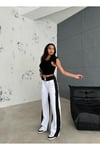 BEYAZ BAGGY PANTOLON YANLARI SİYAH DETAY ŞERİTLİ BELİ LASTİKLİ
