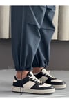 DİZLERİ PİLE DETAYLI PARAŞÜT PANTOLON
