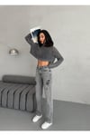 KADIN STRAİGHT JEAN YIRTIK DETAYLI ARA BEL BORU PAÇA KOT PANTOLON GRİ