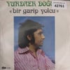 yurdaer-dogulu-bir-garip-yolcu-agora-m-213fa4.jpg