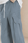 Erkek Keten Kumaş Asimetrik Ve Cep Kapağı Detaylı Baggy Pantolon