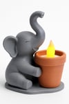 Dekoratif Aydınlatma Mumluk Fil Saksı Mumluk Plastiktir. Tea Light Mum Dahildir.