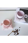 Pembe yastik fincan