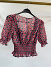TRENDYOL ÇİÇEK DESENLİ GİPELİ CROP