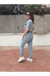 Kadın kot tuşum Önden düğmeli, beli lastikli rahat kalıp denim tulum.