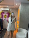 Yanları açık taş rengi tek düğme yelek