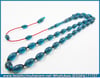 ATEŞ KEHRİBAR TESBİH 6,5*11,5 mm RAFİNERİ MAVİ