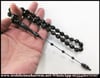 ONİX TAŞ TESBİH 10x12 mm FASETALI KARA ELMAS