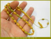 6X11 mm TESBİH-ÜL TURUNÇ HARELİ YEŞİL SARI SIKMA KEHRİBAR TESBİH