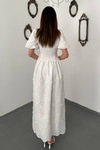 Off-White Embroidered Dress With Balloon Sleeves And Ruched Details.