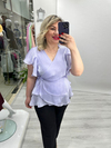 Lila Organze Şifon Kruvaze Yaka Kısa Kol Ve Etek Volanlı Bağlamalı Bluz stp 26y1478