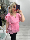 Pembe Organze Şifon Kruvaze Yaka Kısa Kol Ve Etek Volanlı Bağlamalı Bluz stp 26y1478