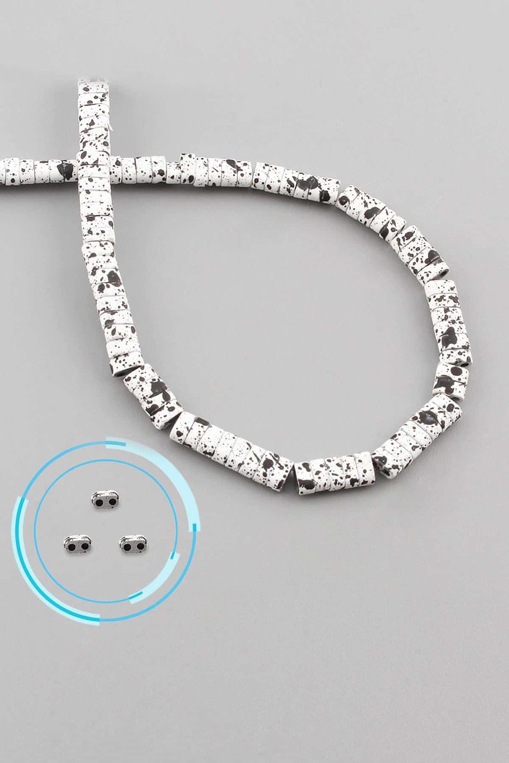 Hematite Natural Stone Matte Mottled White Double Hole 4x2mm String Of Beads
