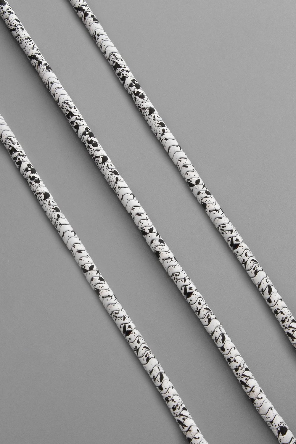 Hematite Natural Stone Matte Mottled White Washer Cut 4x2mm String Of Beads