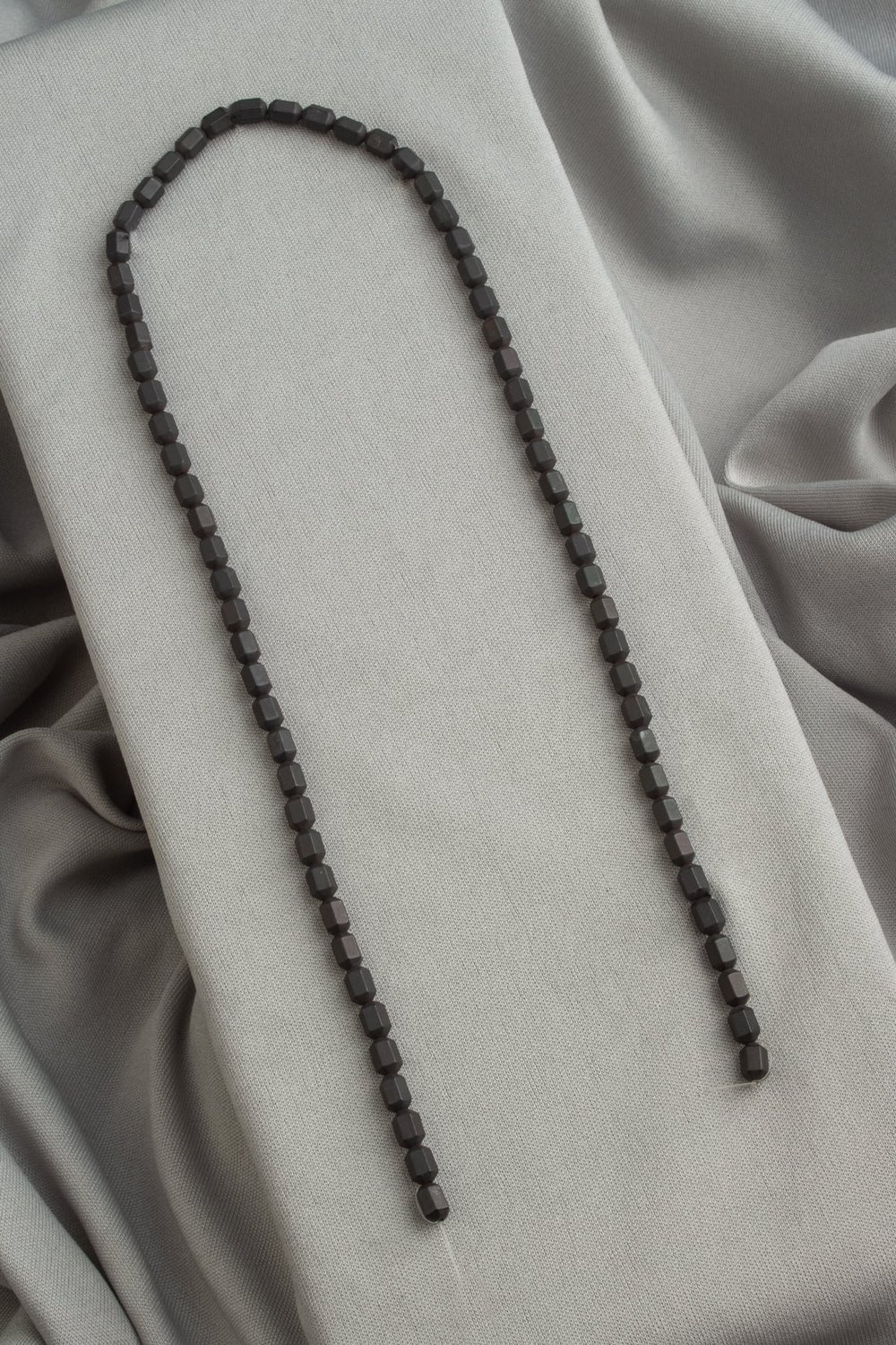 Hematite Stone 4x6mm Hexagon Cylindrical-Cut Bead Strand