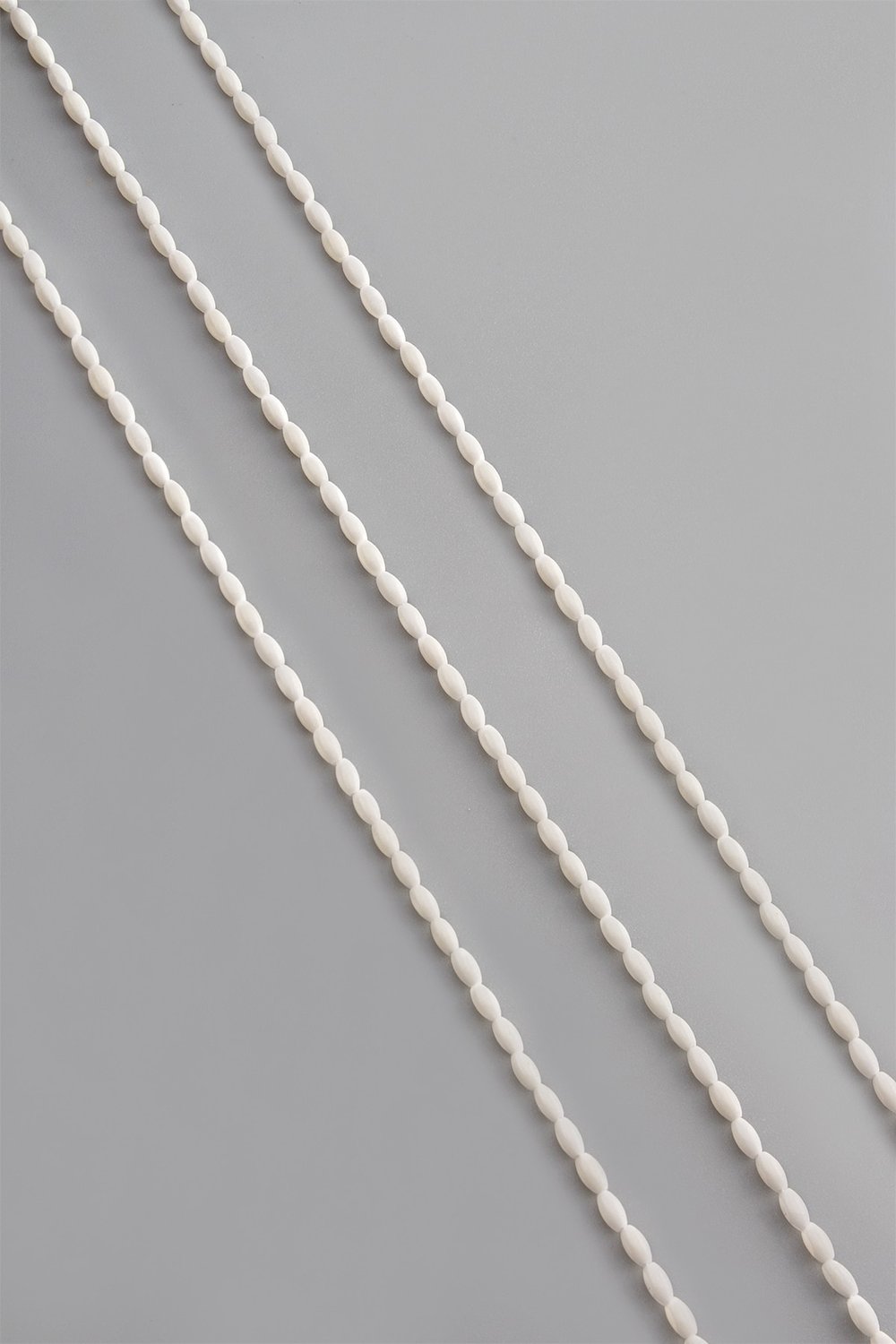 Coral Natural Stone White Barley Cut 2x4mm String Of Beads