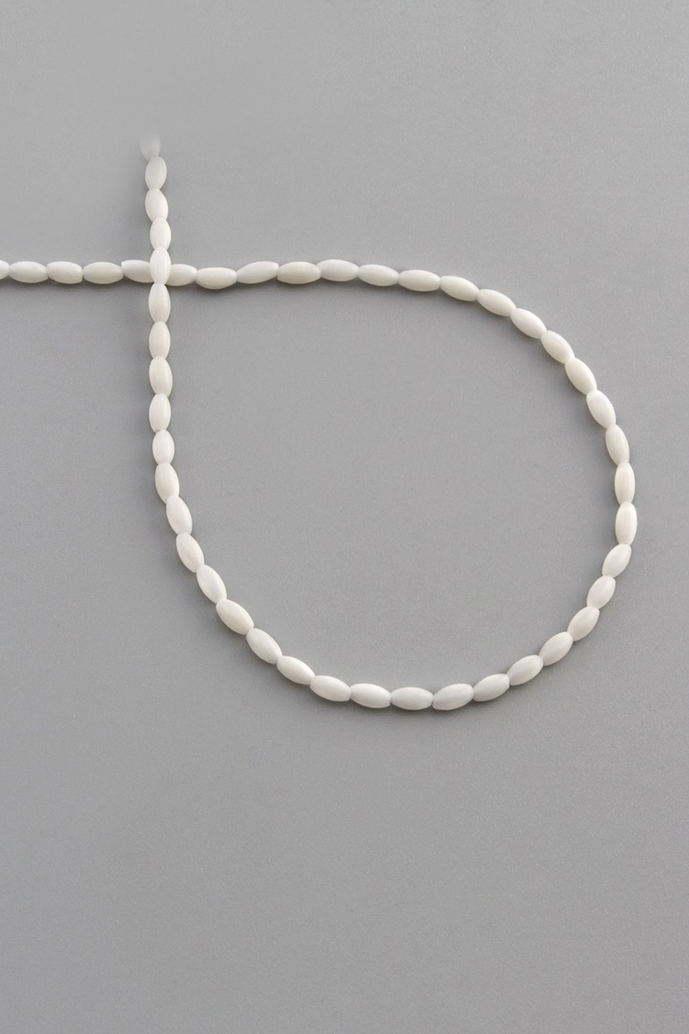 Coral Natural Stone White Barley Cut 2x4mm String Of Beads