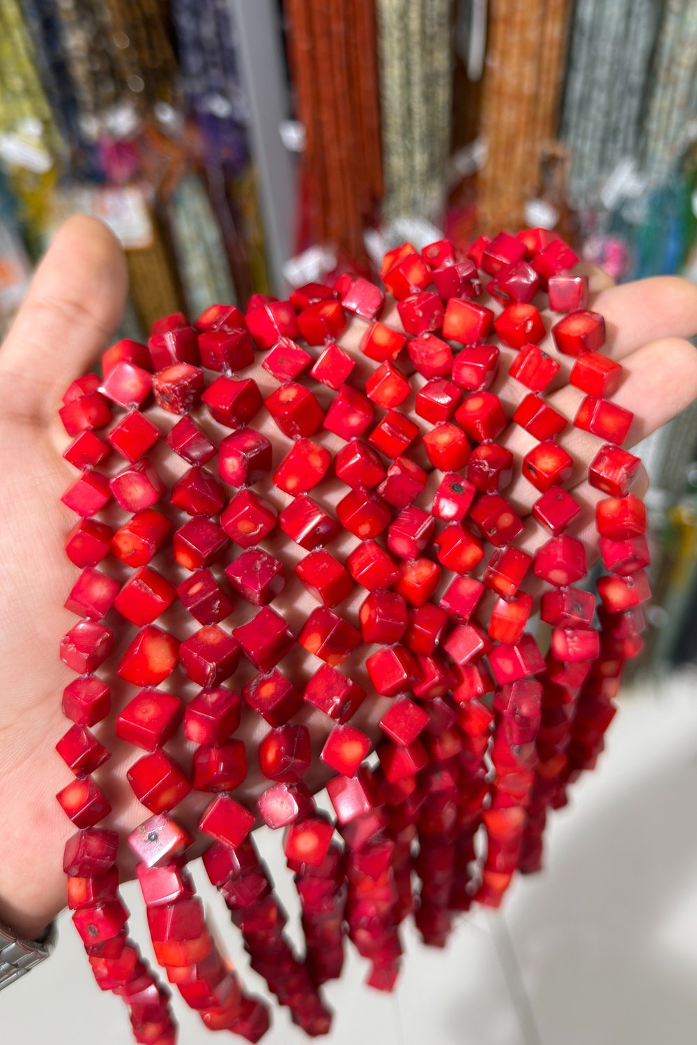 Coral Stone - Diagonal Cube-Cut Shiny Red 9x9mm Bead Strand