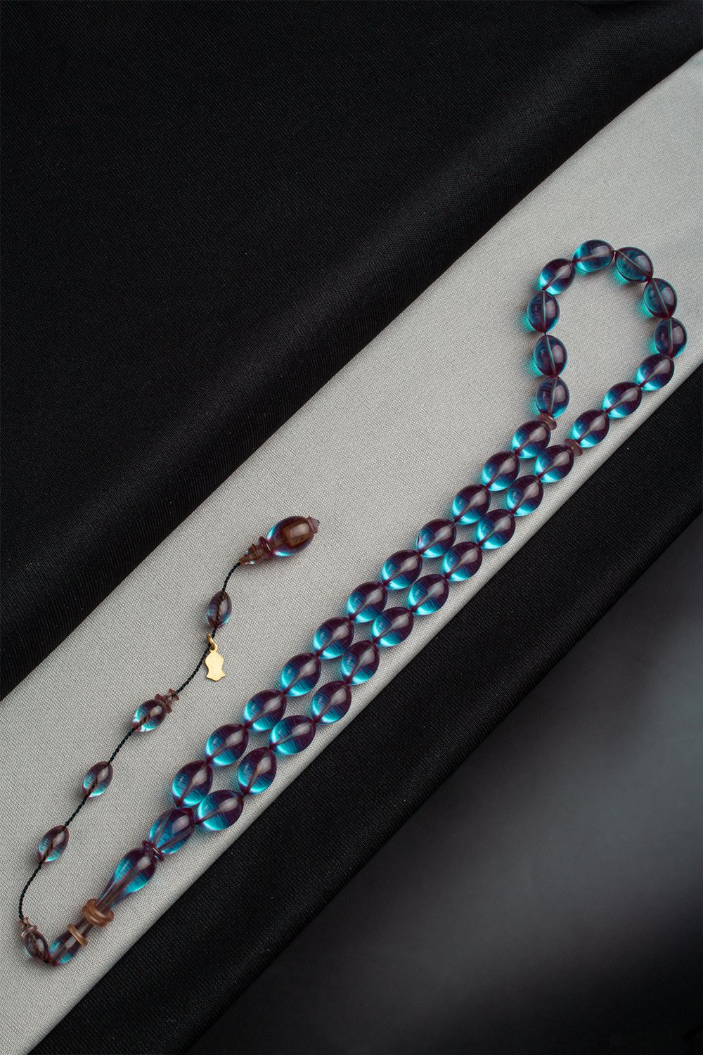 Pressed Amber Blue Capsule-Cut 8x12mm 33-Bead Prayer Beads Tacir - Master Craftsmanship