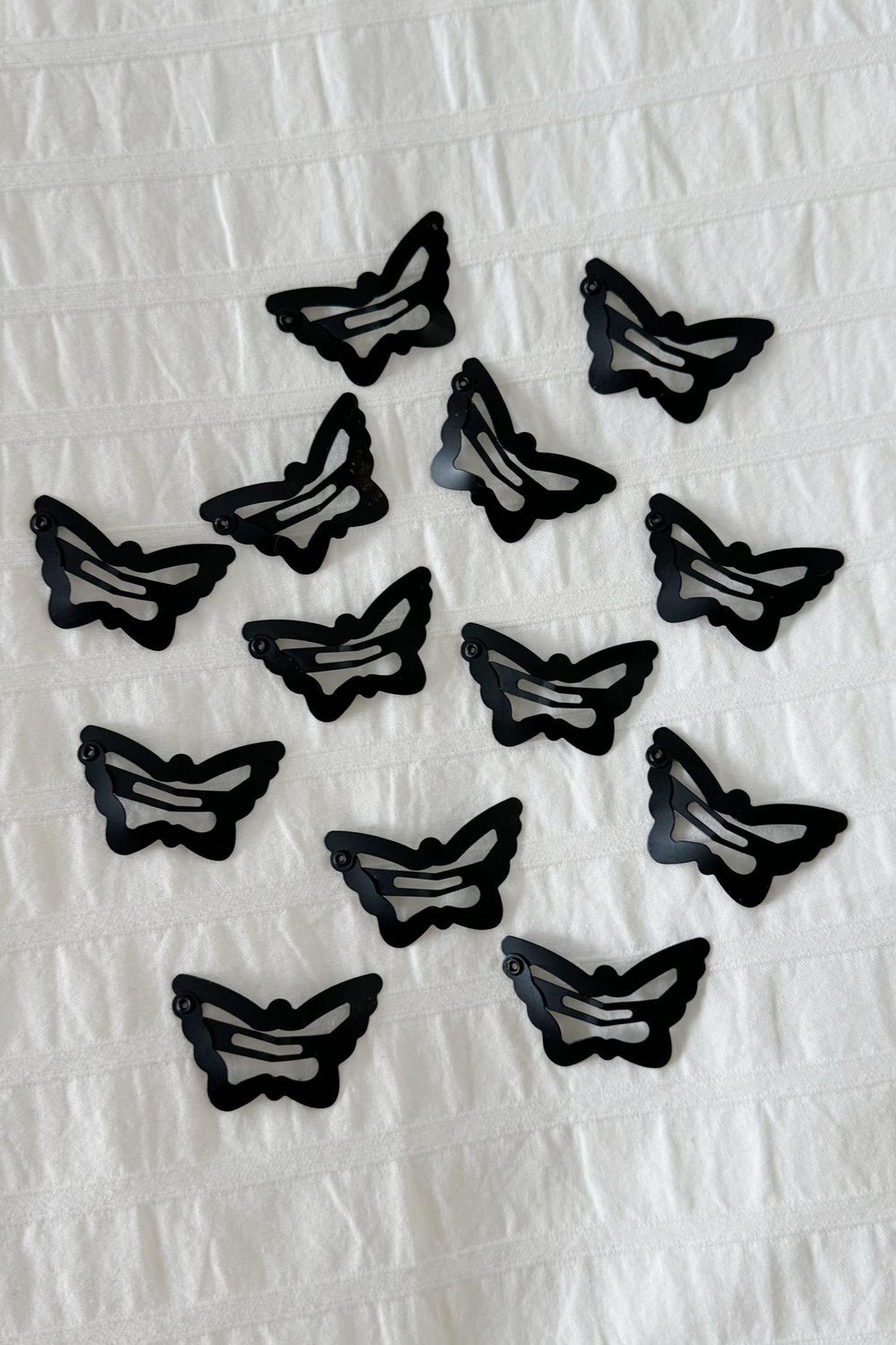 Black Metal Butterfly Toka