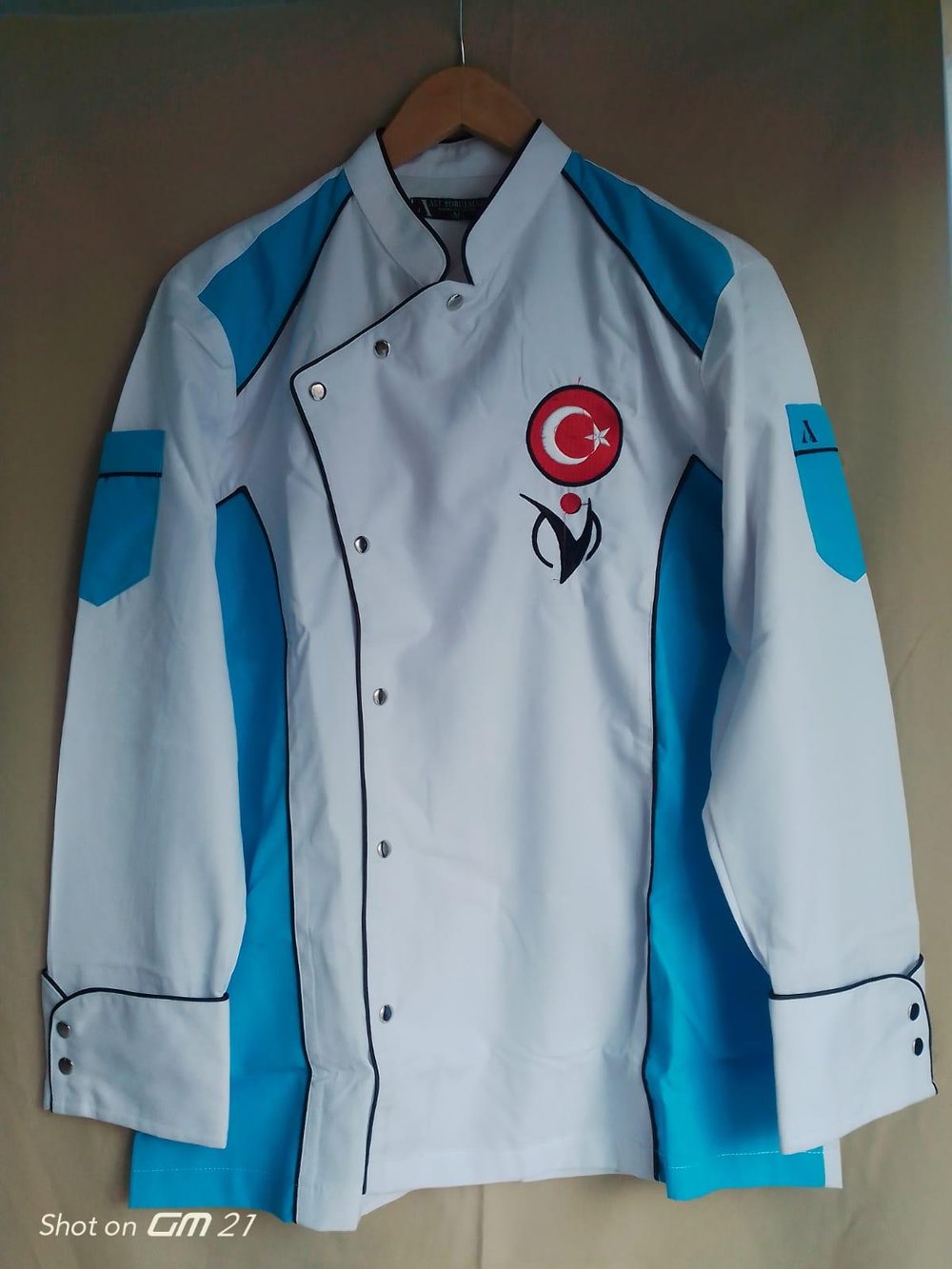 de13561-turkuaz-asci-ceketi-14dda3.jpg