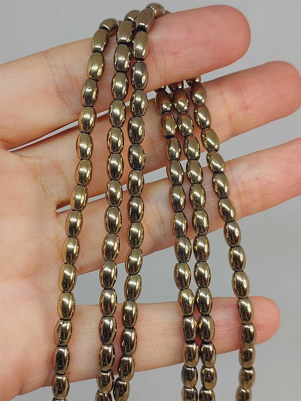 Hematit Taşı Arpa Kesim YARIM Dizi 4*5.5mm (49634) (18cm uzunluğundadır)