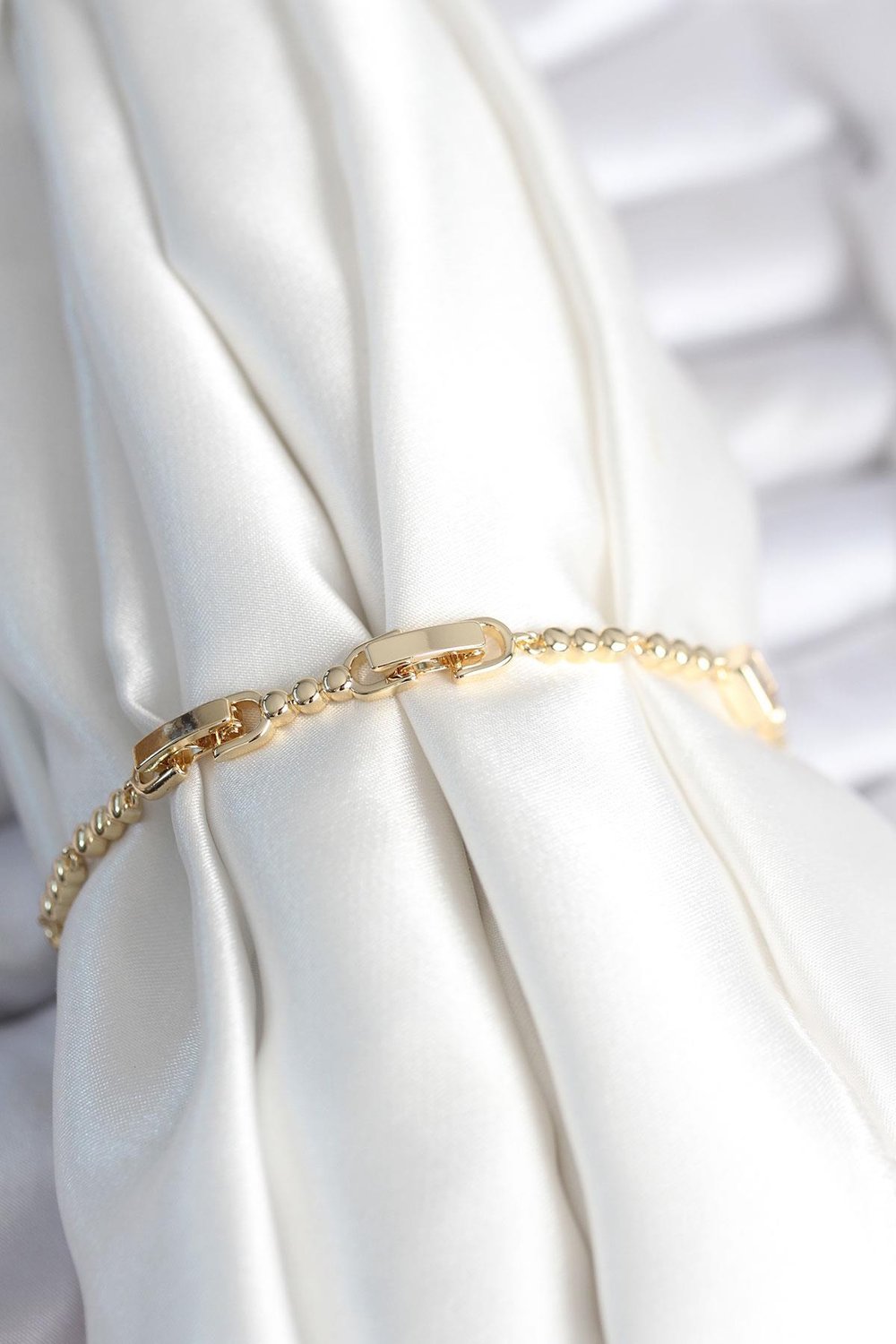 Pirinç Gold Renk Zirkon Taşlı Kalpli Model Kadın Bileklik – PRT3500EB09098