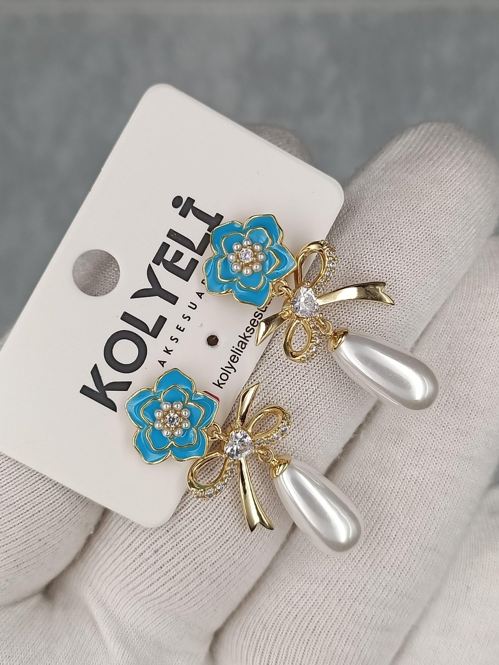 Kolyeli new32 küpe (14 ayar altın rengi)