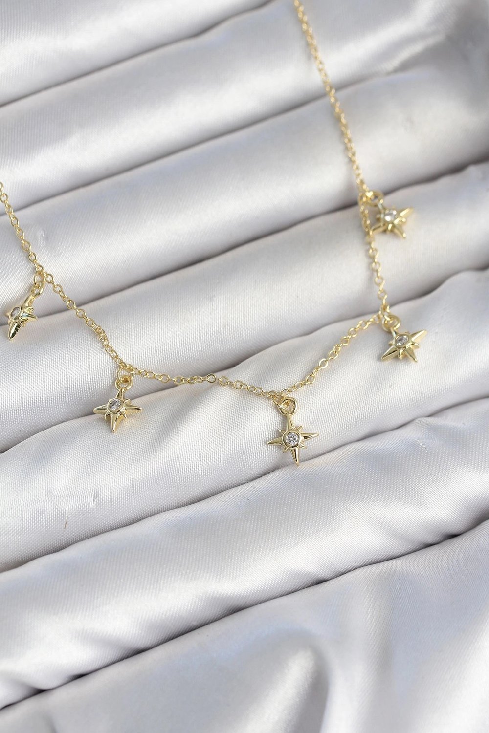 Mey İthalat® Pirinç Gold Renk Sıralı Minimal Kutup Yıldızı Model Kadın Kolye