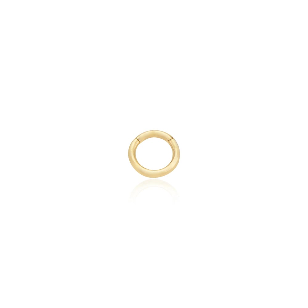 Halka helix piercing