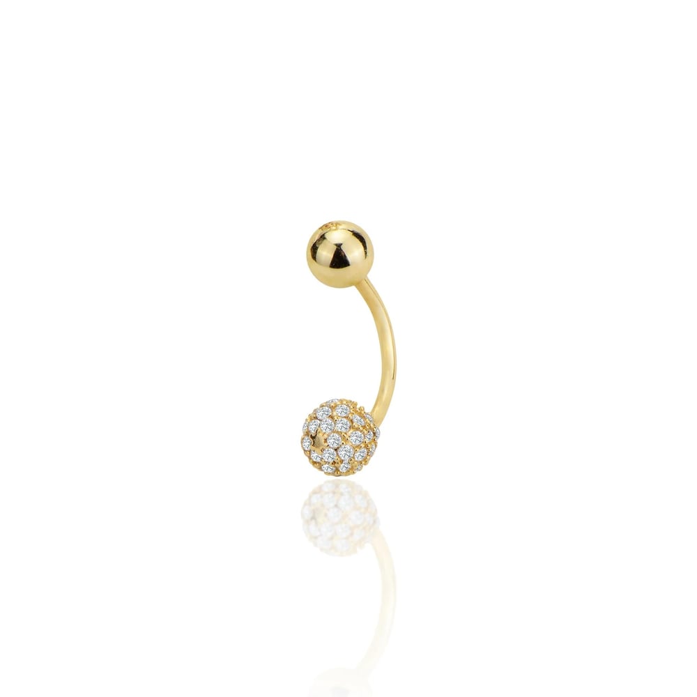 Toplu taşlı göbek piercing