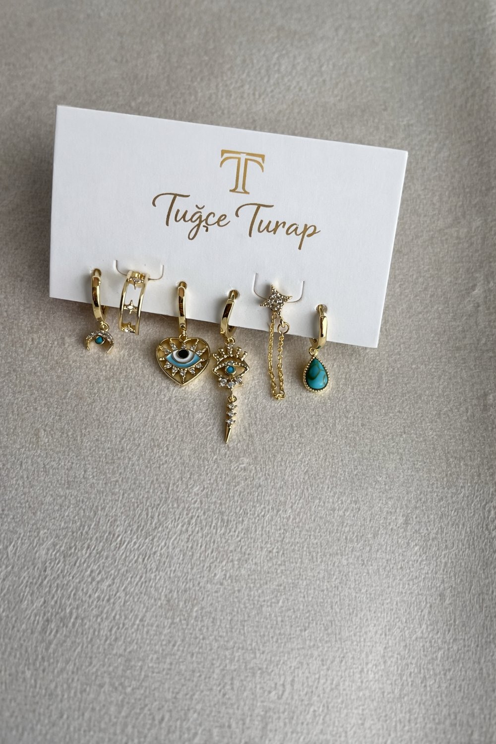 Turkuaz Taşlı Nazar Boncuklu 6'lı Çelik Küpe Seti